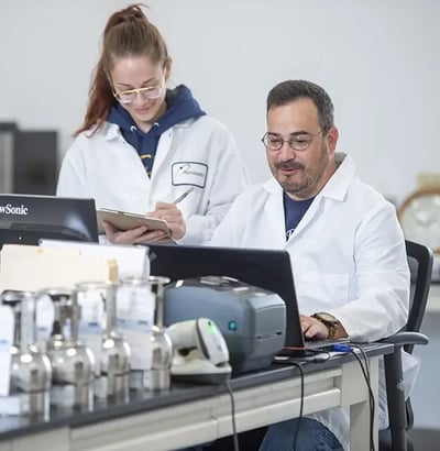Air Lab 2 scientists looking at computer